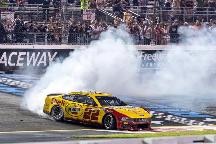 Logano holds off Briscoe to win race at Richmond